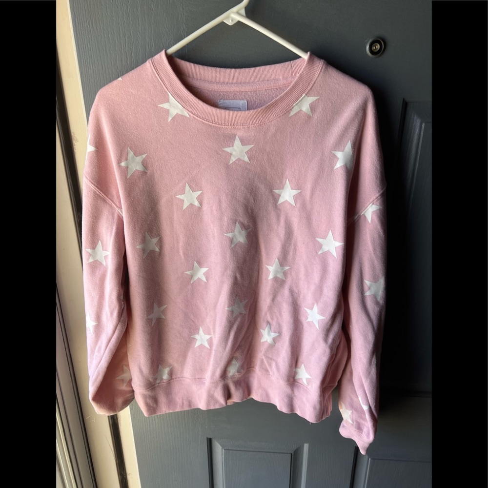 Reflex brand juniors long sleeve sweatshirt.  Sz M.  Pink with with white stars.